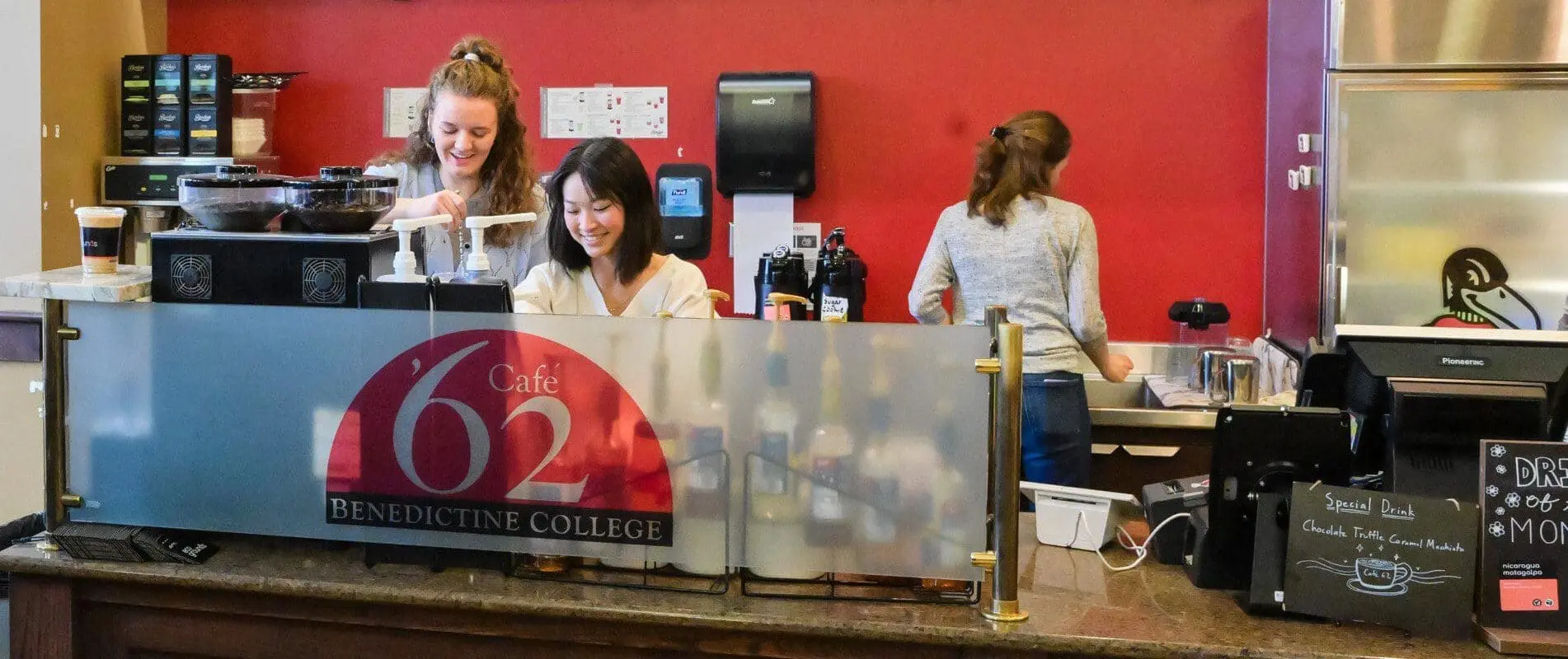 Baristas working in Cafe 62